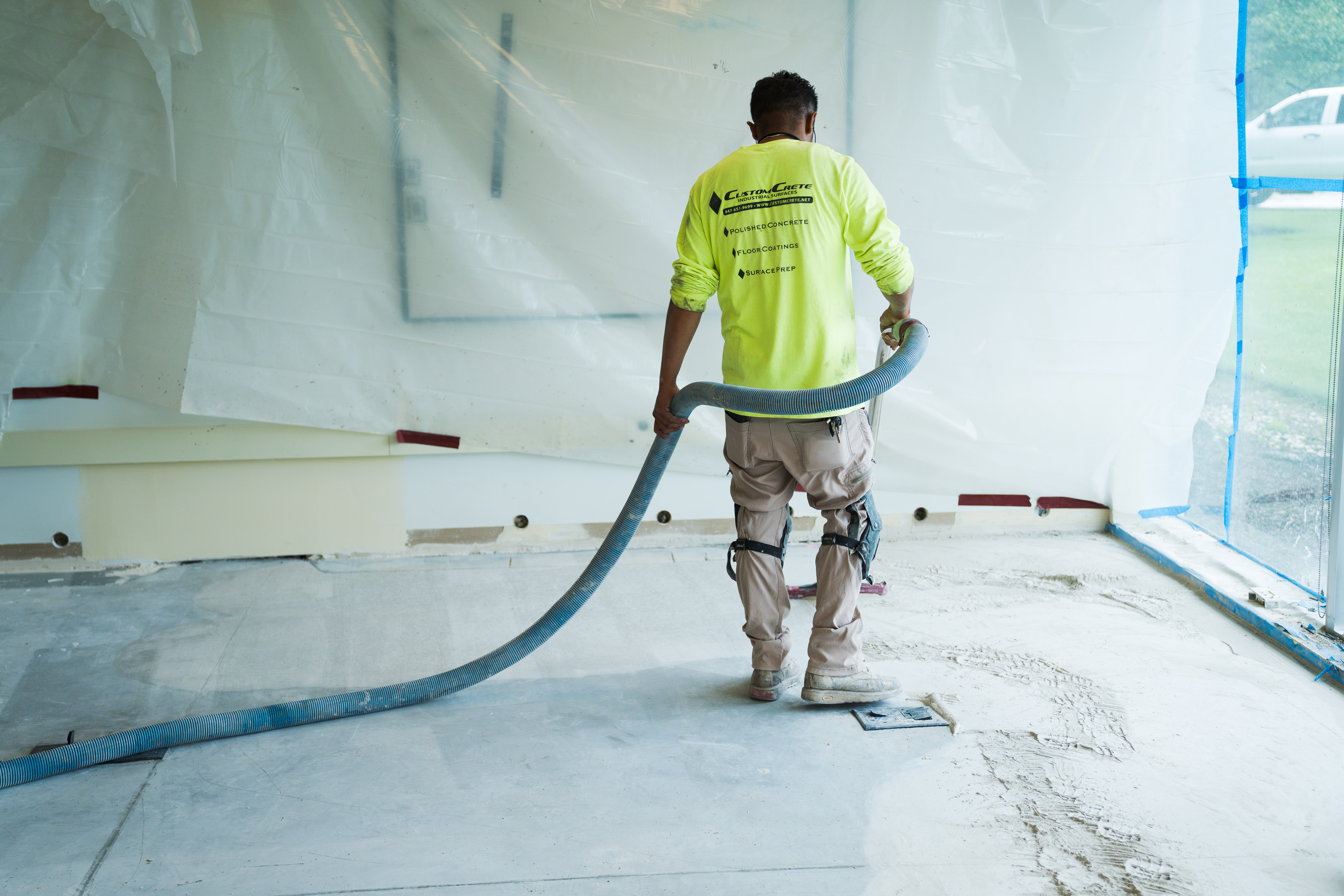 Vacuuming concrete flooring