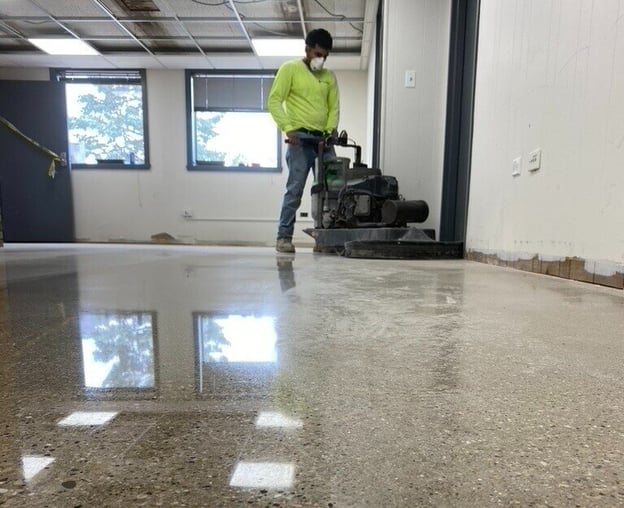 Person polishing concrete