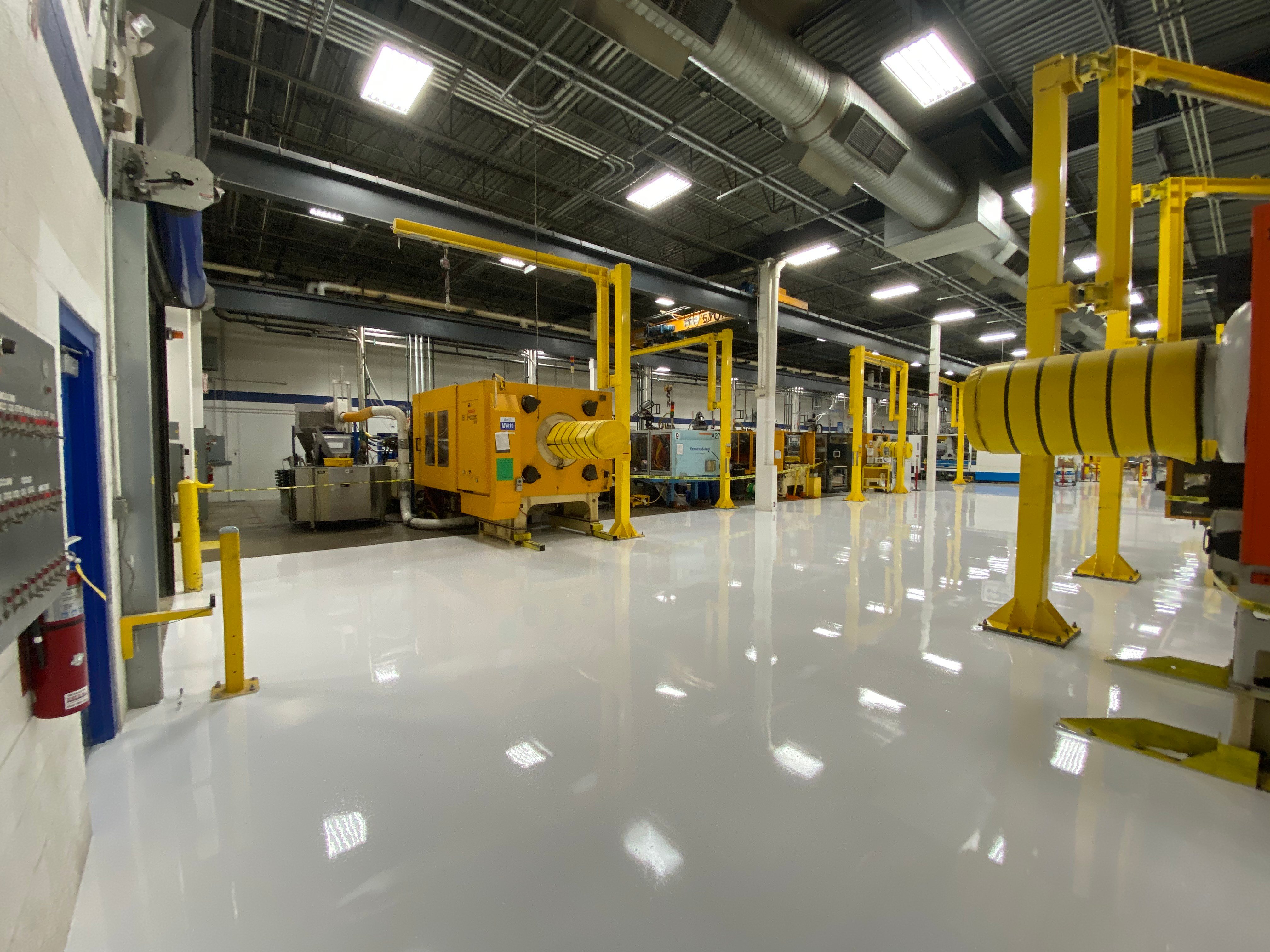 white epoxy floors in a factory in illinois installed by customcrete