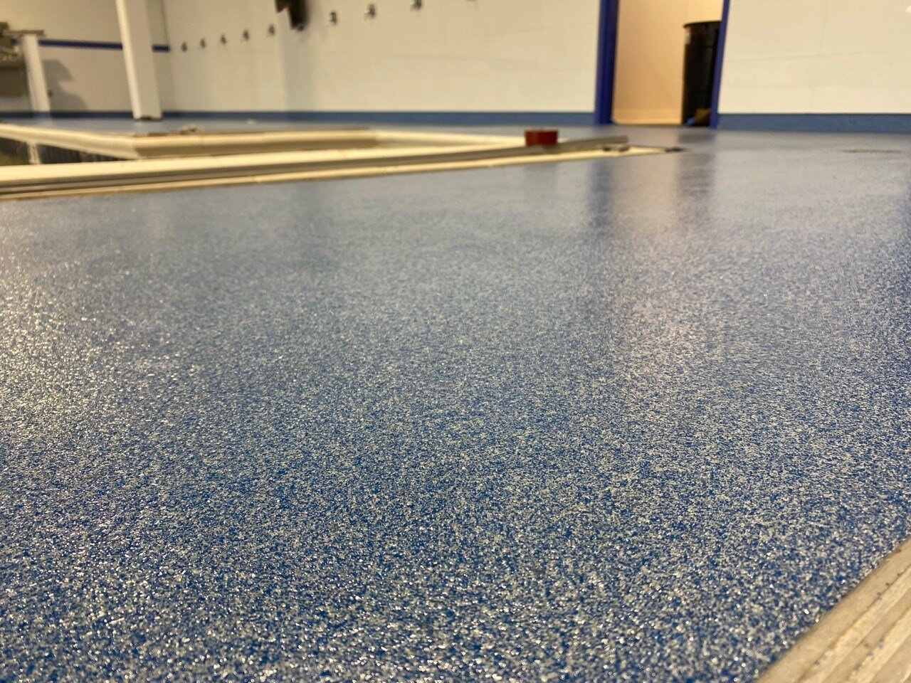 textured blue coated concrete floor in an Illinois facility 