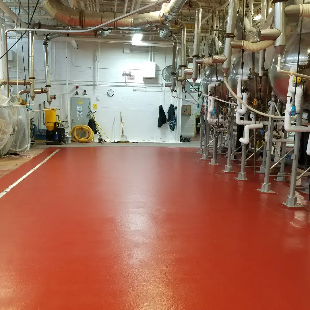 red textured Urethane Cement floor in a food plant in illinois installed by customcrete