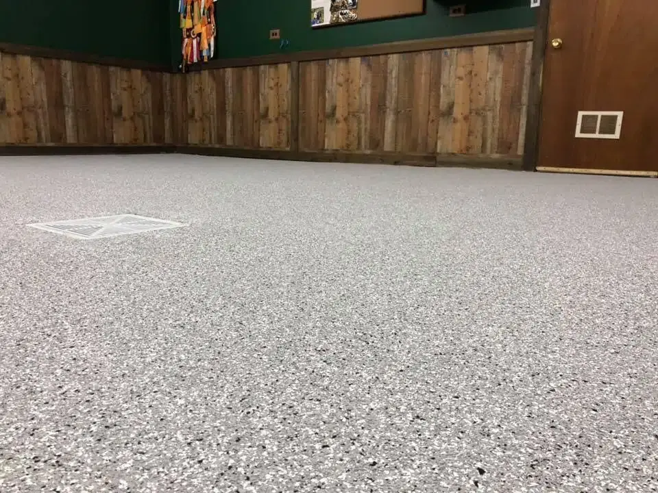 Epoxy floor with grey decorative flake in a Naperville facility