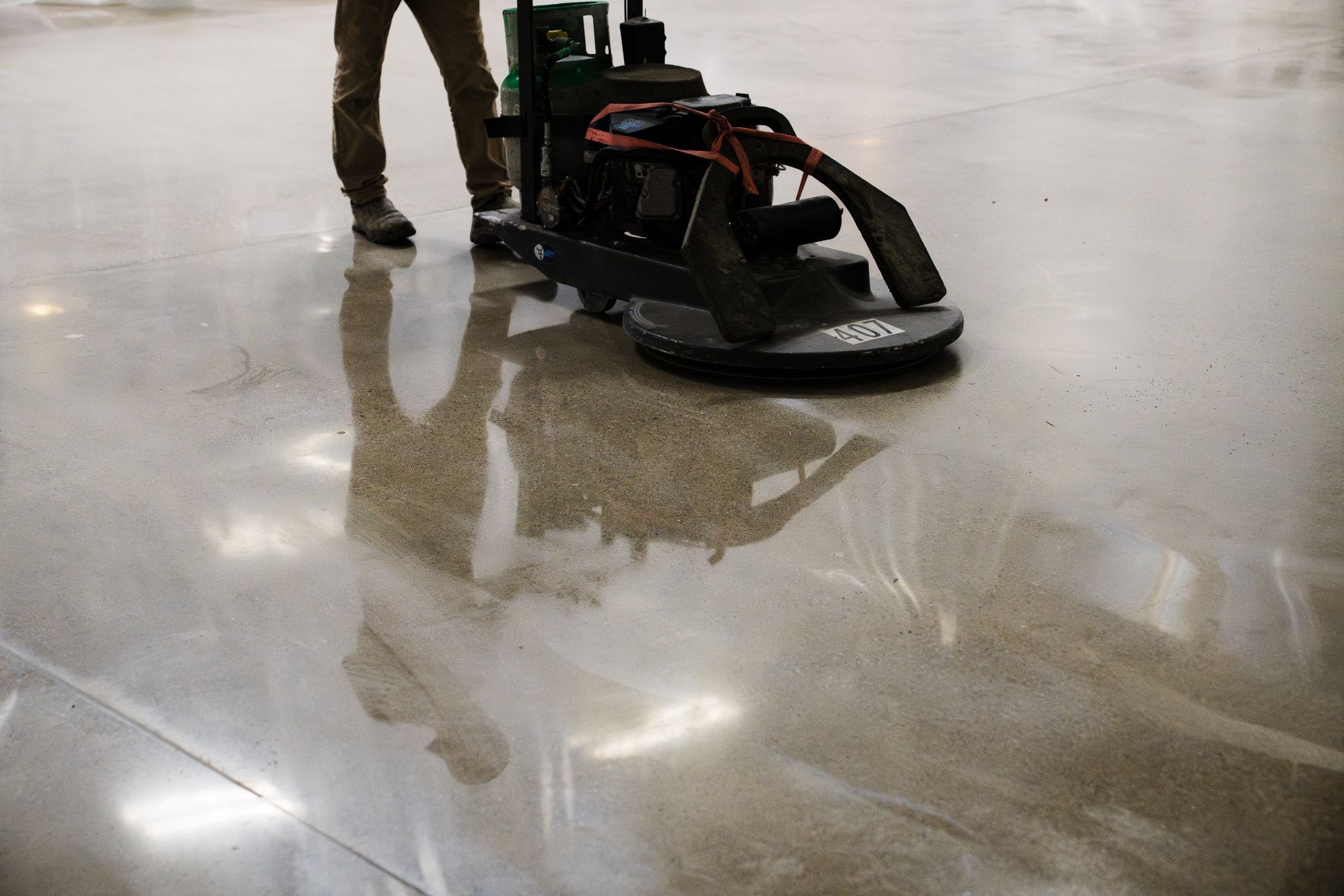 CustomCrete team applying polished concrete