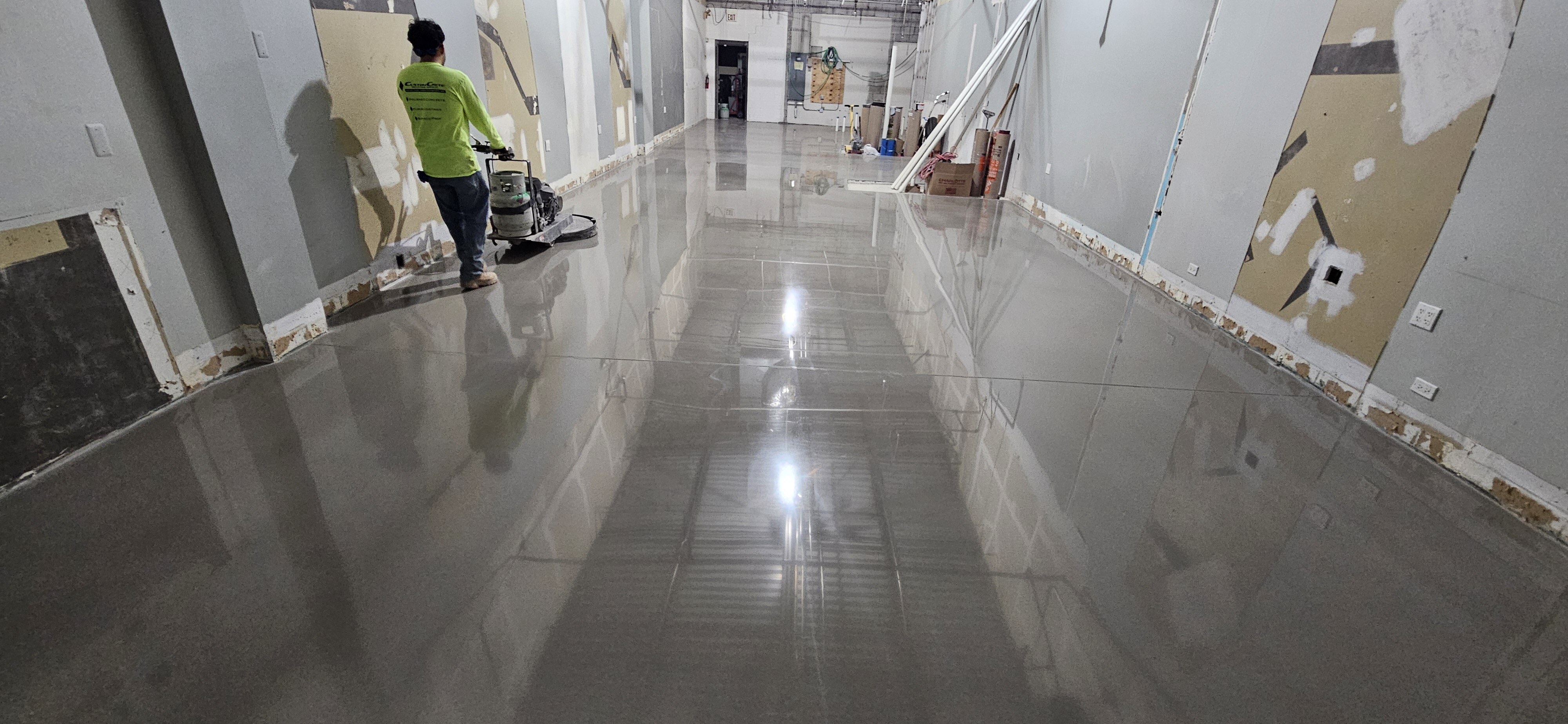 True PC concrete overlay installed by a customcrete worker in a chicagoland bussiness